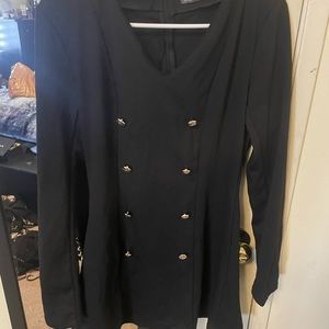 Black dress with gold buttons.